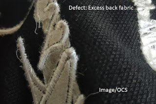 Excess back fabric in embroidery