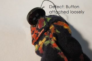 Button attach loosely Button attach loosely