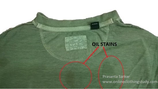 Oil staining in garment Oil staining in garment